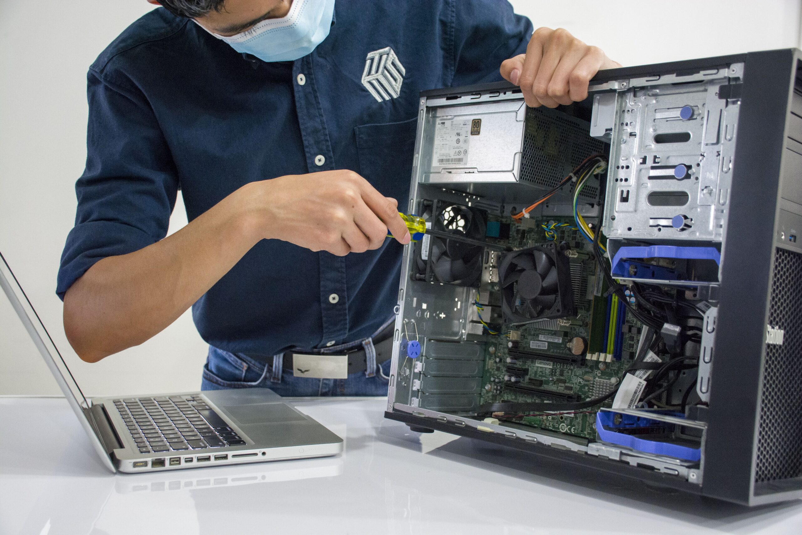 IT Support and Repairs Agency technicians configuring hardware and network infrastructure